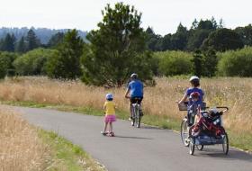 Family biking on Graham Oaks trail