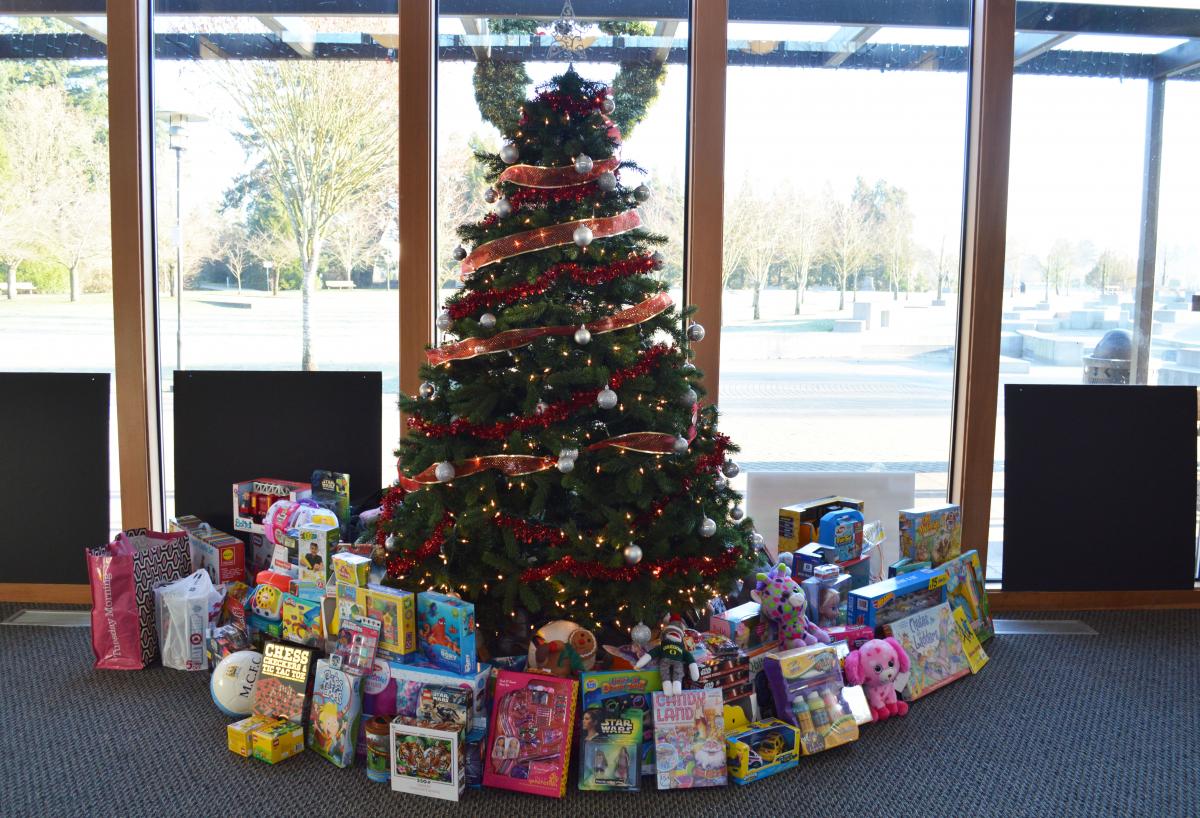 Donated toys surround the tree at Wilsonville Parks and Rec.