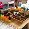 photo of block letters  and play dough